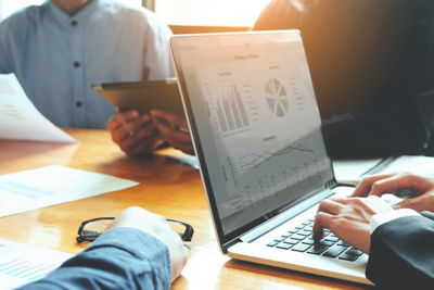 Laptop displaying financial results