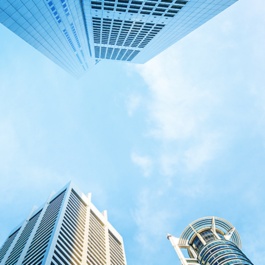 A picture of some office buildings and the sky