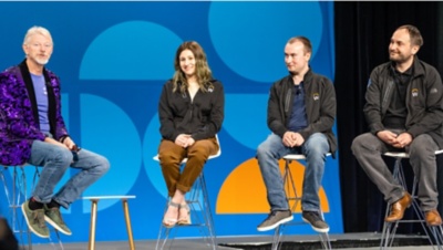 Chris Bledsoe and Speakers on stage at DevCon