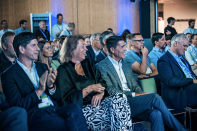 Elevate Attendees watching speech