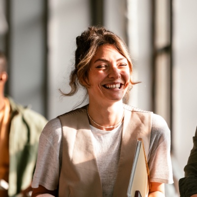 Group of coworkers smiling in office