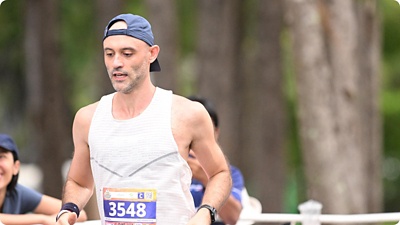 Marcello, a program manager at Workday running in a race.