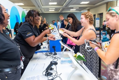 People at an event talking.