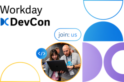 Attendees looking at a laptop at Workday DevCon