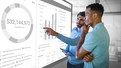 People analyzing a financial graph.