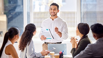 Man speaking to team