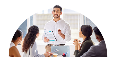 Man speaking to a group of employees.