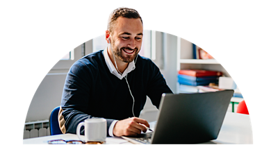 Person looking at laptop.