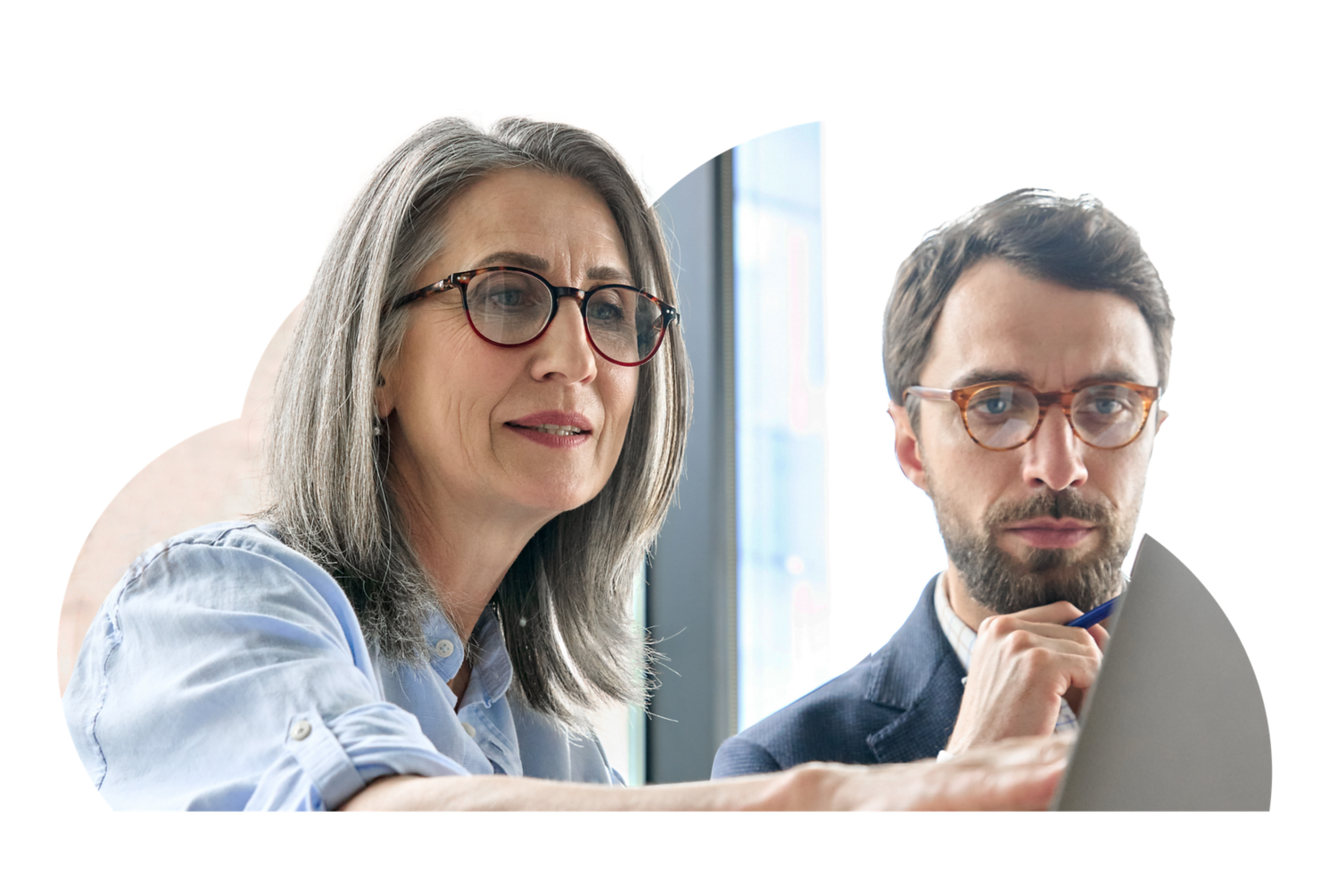 CFO and CIO reviewing work on a screen