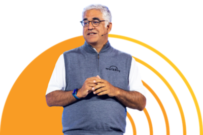 Aneel Bhursi speaking to a crowd