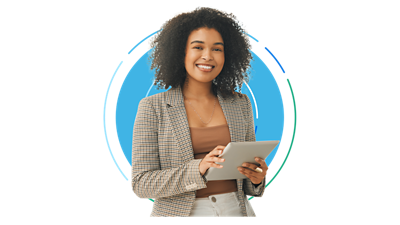 Woman looking at a device, smiling.