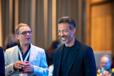 Men meeting up and having conversations in the event 