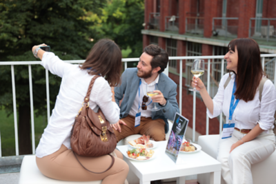 Attendees taking selfie 