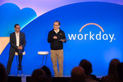 Men having speech on stage