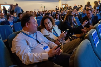 Attendees gathering before speeches 