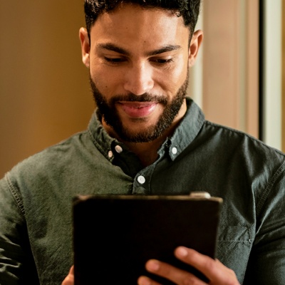 Man looking at ipad