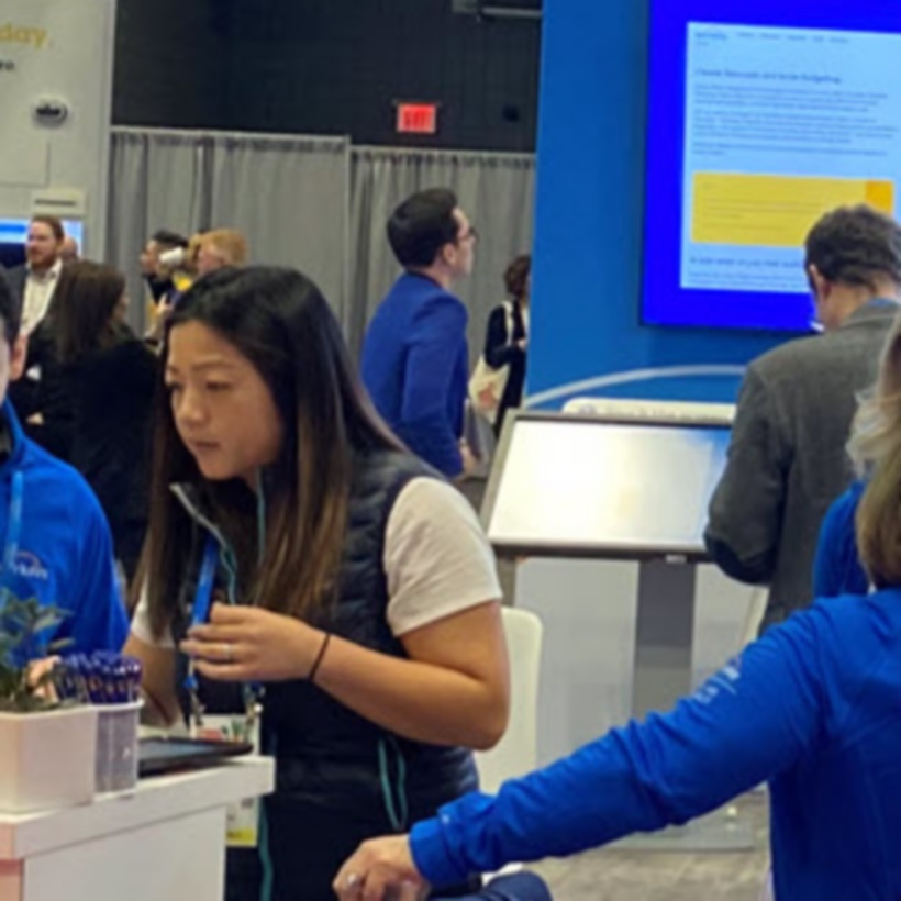 crowded Workday booth at a conference