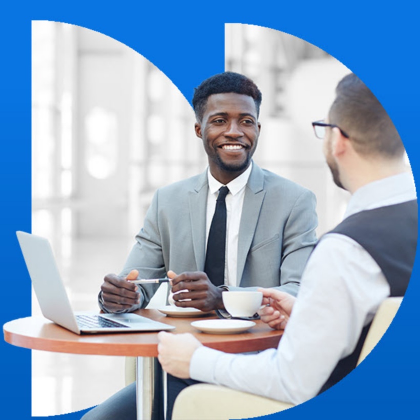 Two employees working at a table