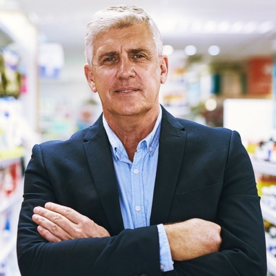 Business leader wearing a suit in a retail store