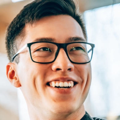 Smiling employee at a work station