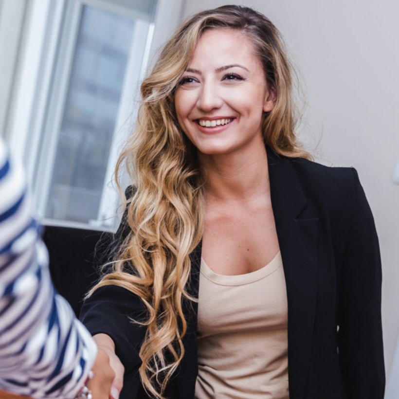 two colleagues shaking hands