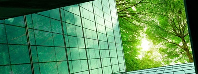 office building with view of green treetops