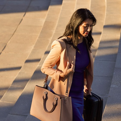 A woman giving a financial presentation in an office